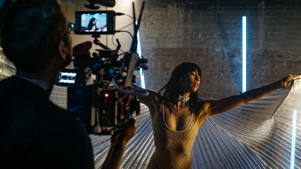 Camera crew filming a dancer