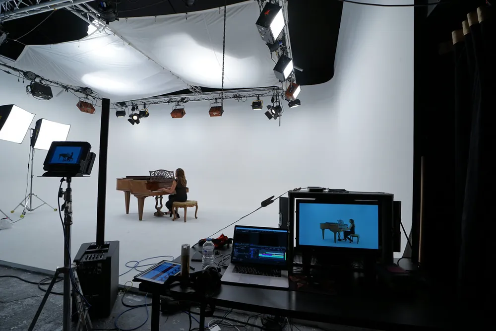 Studio shoot with a pianist and monitors
