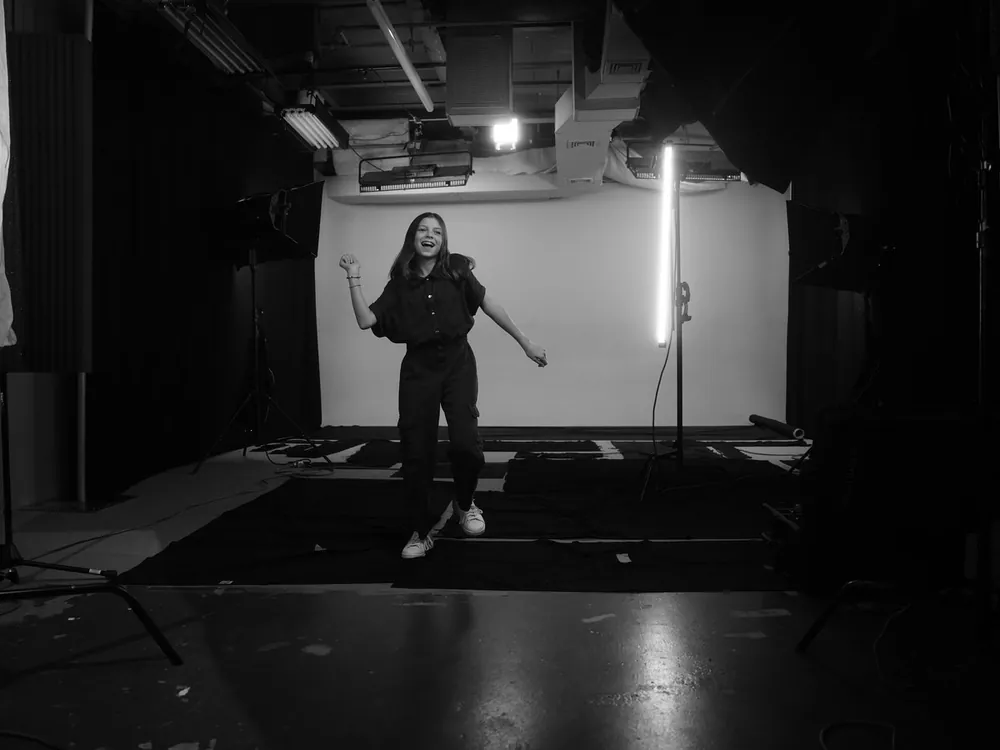 Performer in a black box studio