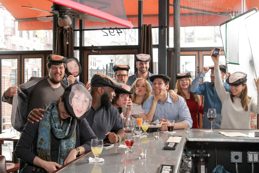 Cast in paper face masks at a bar