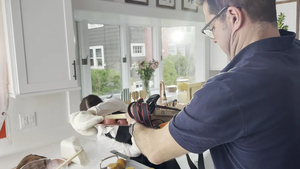 Stylist arranging a tabletop food shot